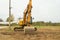 Excavator performs excavation work in the swamp