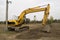 Excavator performs excavation work in the swamp