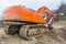 Excavator ready to start digging on a construction site.