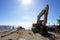 Excavator rest on beach after clear jetty structure at Wonnapa beach