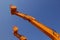 Excavator scoop in sky