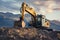 Excavator on top of a dirt mound