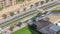 Excavator, truck and grader working at road construction site in Dubai downtown timelapse