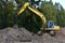 Excavator with Vertical tamrock pile foundation drilling machine. Drill rig at forest area. Ground Improvement techniques,