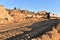 Excavator working on earthmoving at open pit mining. Backhoe digs sand and gravel in quarry. Heavy Construction Equipment Machines