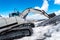 Excavator working in high Alps Austria