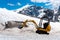 Excavator working in high Alps Austria