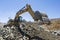 Excavator working in a mine.