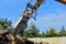 Excavator in working in a quarry. Excavator bucket