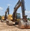 Excavators lined up in a row