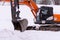 Excavators on a winter building site