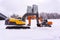 Excavators on a winter building site