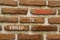 Exceed to succeed symbol. Concept words Exceed to succeed on beautiful brown brick. Beautiful brown brick wall background.