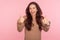 Excellent job, well done! Portrait of joyful awesome young woman with brunette wavy hair showing like gesture