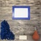 Excellent mocap place for text, with blue wool, soap, orange watering felting on a wooden background