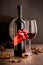 Excellent wine with ribbon and wineglass