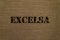 Excelsa text made up of coffee beans on a canvas background