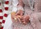 Exchange of wedding rings on Asian wedding