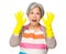 Excite housewife with plastic gloves and raise hand up