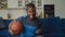 Excited African American basketball fan making winning closed fist gesture