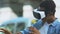 Excited African-American teen boy using VR headset, modern technologies, future