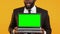 Excited Afro-American manager showing laptop with green screen, online job offer