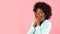 Excited Black Woman Shouting Touching Face Looking Aside, Pink Background