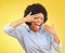 Excited black woman surprised hand on face and shocked winning person isolated in studio yellow background. Portrait, V
