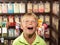 Excited Boy Standing In Sweet Shop