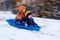 Excited Boys on Sled Ride