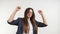 Excited business woman celebrating triumph -