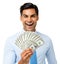 Excited Businessman Holding Fanned Out Dollar Notes