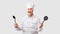 Excited Chef Man Holding Ladle And Slotted Spoon, White Background