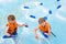 Excited children in water park riding on slide with float