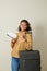 Excited College Girl with Suitcase