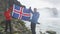 Excited Couple Holding Iceland Flag At Godafoss Iceland Tourist Destination