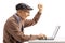 Excited elderly man with a laptop computer gesturing happiness