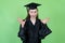 Excited french female graduate student with academic dress and cap