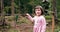 Excited girl admiring view at forest