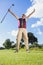 Excited golfer cheering and looking at camera