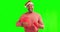 Excited, green screen and man with a christmas present and santa claus hat in studio for festive. Happy, celebration and