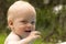 Excited happy baby with wet hair after bathing looking with interest. Childhood, portrait, baby boy, happiness, excitement concept