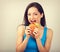 Excited happy hungry woman wanting to bite tasty burger on blue background. Closeup