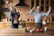 Excited healthy senior couple dance cooking together