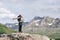 Excited hiker celebrating success in a high mountain