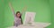 Excited Hispanic business woman raising arms and celebrating at computer desk