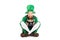 Excited leprechaun in green suit holding pot of gold