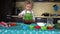 Excited little girl mixing preparing dough for cake baking in kitchen