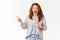 Excited lively impressed redhead middle-aged 45s woman stylish blouse drop jaw thrilled pointing left index finger check