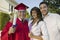 Excited Male Graduate With Family